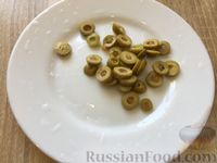 Фаршированные кабачки с кускусом, зелёным горошком и оливками